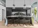 Modern kitchen with large island and dark cabinetry at 780 Eldorado Ave, Clearwater, FL 33767