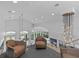 Elegant sitting area with leather chairs and stunning views at 780 Eldorado Ave, Clearwater, FL 33767