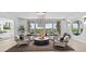Elegant living area with seating and a statement chandelier at 780 Eldorado Ave, Clearwater, FL 33767