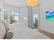 Main bedroom with ocean views and access to private balcony at 780 Eldorado Ave, Clearwater, FL 33767
