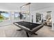 Modern game room with a pool table and plenty of natural light at 780 Eldorado Ave, Clearwater, FL 33767