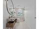 Modern bathroom with marble vanity, large mirror, and walk-in shower at 780 Eldorado Ave, Clearwater, FL 33767
