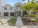 Two story home with landscaped yard and driveway at 780 Eldorado Ave, Clearwater, FL 33767