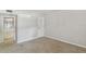 Bright bedroom with neutral walls and carpet, plus an ensuite bathroom at 11812 Raintree Lake Ln # B, Tampa, FL 33617