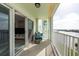 Relaxing balcony with water view and seating at 400 64Th Ave # 704, St Pete Beach, FL 33706