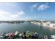 Aerial view of waterfront property with boats and beautiful water at 400 64Th Ave # 704, St Pete Beach, FL 33706