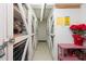 Hallway of private storage units for building residents at 400 64Th Ave # 704, St Pete Beach, FL 33706