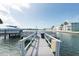 Private dock with walkway leading to the water at 400 64Th Ave # 704, St Pete Beach, FL 33706