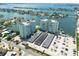 Aerial view showing building, parking and waterfront at 400 64Th Ave # 704, St Pete Beach, FL 33706