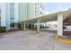 Convenient covered entrance to the building at 400 64Th Ave # 704, St Pete Beach, FL 33706