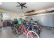 Bike storage room with various bicycles and lockers at 400 64Th Ave # 704, St Pete Beach, FL 33706