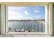 Stunning water view from balcony, boats and blue sky at 400 64Th Ave # 704, St Pete Beach, FL 33706