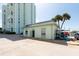Building exterior with kayak storage and waterfront access at 400 64Th Ave # 704, St Pete Beach, FL 33706