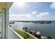 Stunning waterfront view from balcony, showcasing boats and water at 400 64Th Ave # 704, St Pete Beach, FL 33706