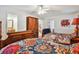 Bedroom featuring twin beds, closet, ensuite bathroom, and an abundance of natural light at 3520 Leslie West Rd, Dover, FL 33527
