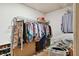 Walk-in closet with clothing racks and shelves offering optimal storage and organization at 3520 Leslie West Rd, Dover, FL 33527