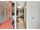 Inviting foyer showcasing tiled floors and a glimpse into the eat-in kitchen at 3520 Leslie West Rd, Dover, FL 33527