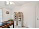 Office space with desk and bookshelves, ideal for working from home at 3520 Leslie West Rd, Dover, FL 33527