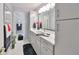 Modern bathroom with updated fixtures and a large vanity at 100 Bluff View Dr # 404A, Belleair Bluffs, FL 33770