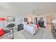 Cozy bedroom with red accents and ample closet space at 100 Bluff View Dr # 404A, Belleair Bluffs, FL 33770