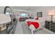 Serene bedroom with water views and a comfortable sitting area at 100 Bluff View Dr # 404A, Belleair Bluffs, FL 33770