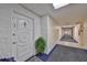Building hallway with elevator access at 100 Bluff View Dr # 404A, Belleair Bluffs, FL 33770