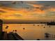 Stunning sunset over the calm waters at 100 Bluff View Dr # 404A, Belleair Bluffs, FL 33770