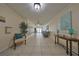 Building lobby with comfortable seating and mailboxes at 100 Bluff View Dr # 404A, Belleair Bluffs, FL 33770