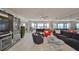 Living room with water views and comfortable seating at 100 Bluff View Dr # 404A, Belleair Bluffs, FL 33770