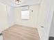 Bright bedroom with vinyl flooring and window coverings at 8738 N Tangerine Pl, Tampa, FL 33617