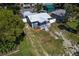 Aerial view showcasing the house and surrounding neighborhood at 8738 N Tangerine Pl, Tampa, FL 33617