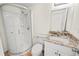 Clean bathroom with granite vanity, and a shower/tub combo at 8738 N Tangerine Pl, Tampa, FL 33617