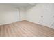 Simple bedroom with vinyl flooring and neutral walls at 8738 N Tangerine Pl, Tampa, FL 33617