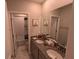 Double sink bathroom with granite countertop at 10066 Corso Milano Dr, Tampa, FL 33625