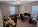 Home office with two desks and hardwood floors at 10066 Corso Milano Dr, Tampa, FL 33625