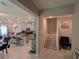 Open concept kitchen and living area with an island, stainless steel appliances, and a dining area at 10066 Corso Milano Dr, Tampa, FL 33625