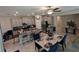 Open concept kitchen and dining area with an island and seating at 10066 Corso Milano Dr, Tampa, FL 33625