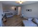 Spacious bonus room with hardwood floors and plenty of natural light at 10066 Corso Milano Dr, Tampa, FL 33625