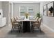 Dining room with a large table, eight chairs, and neutral decor at 4281 Frontera Ln, Wesley Chapel, FL 33543