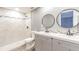 Updated bathroom with double vanity, large shower, and modern fixtures at 4509 Tidal Pond Rd, New Port Richey, FL 34652