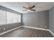 Spacious bedroom with large windows and flooring at 4509 Tidal Pond Rd, New Port Richey, FL 34652
