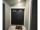 Inviting entryway with double doors and tiled flooring at 4509 Tidal Pond Rd, New Port Richey, FL 34652
