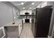 Modern kitchen with stainless steel appliances at 4509 Tidal Pond Rd, New Port Richey, FL 34652