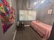 Cozy bedroom with a pink bed and grey walls at 4509 Tidal Pond Rd, New Port Richey, FL 34652