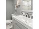 Updated bathroom with double vanity and grey cabinets at 4509 Tidal Pond Rd, New Port Richey, FL 34652