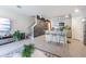 Open living room and kitchen with modern design elements at 2714 Chestnut Creek Pl, Brandon, FL 33510