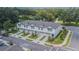 Aerial view of townhouses with gray roofs and attached garages at 2714 Chestnut Creek Pl, Brandon, FL 33510