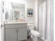 Clean bathroom with granite countertop and updated fixtures at 2714 Chestnut Creek Pl, Brandon, FL 33510