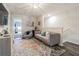 Spacious loft area with comfortable seating at 2714 Chestnut Creek Pl, Brandon, FL 33510