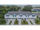 Five-unit townhome building with individual garages at 2714 Chestnut Creek Pl, Brandon, FL 33510